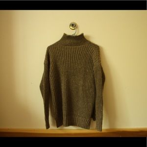 Knitted brown turtle neck sweater